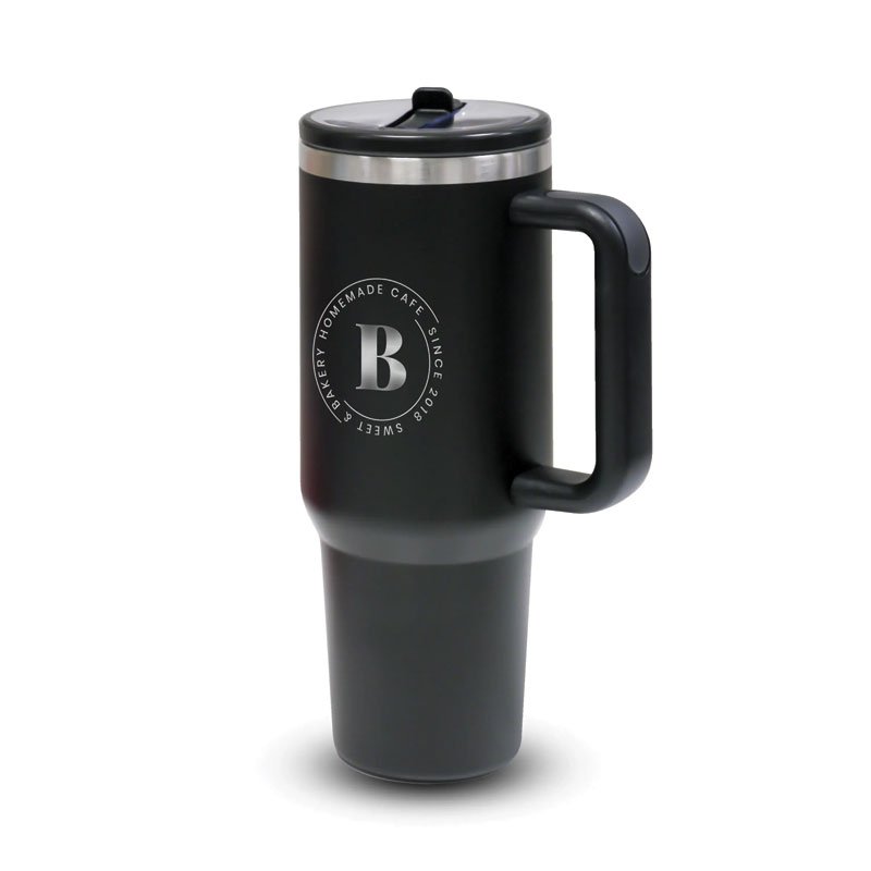 Black double-walled tumbler with handle and flip straw, reusable travel cup